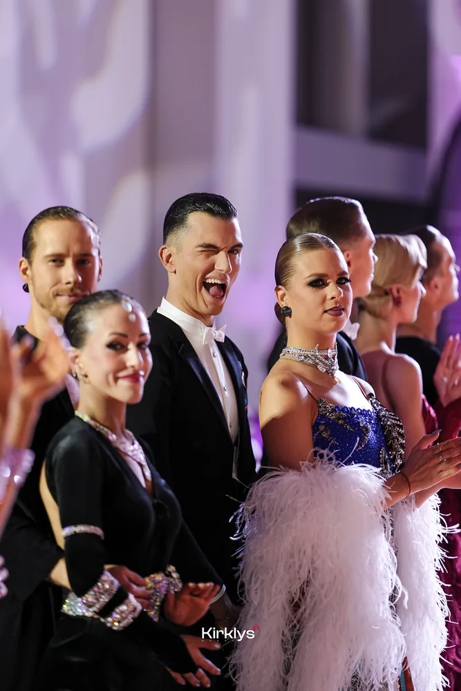 Festival guests sharing a celebratory moment at Jurmala in 2025.