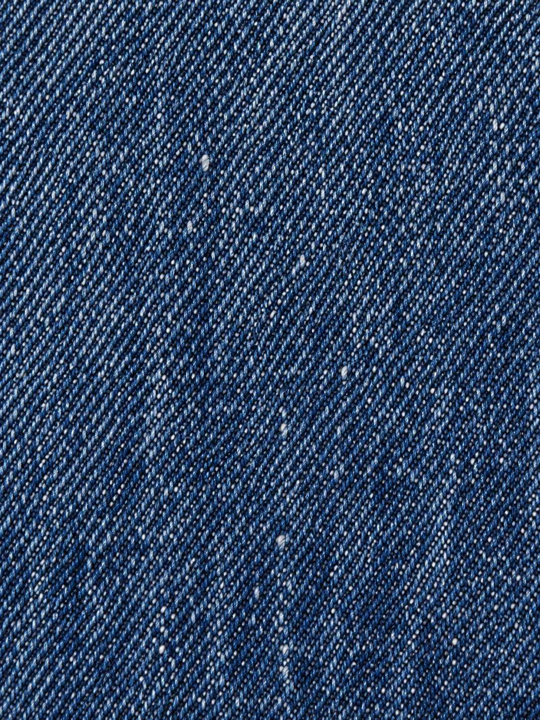 Close-up of dark indigo denim weave