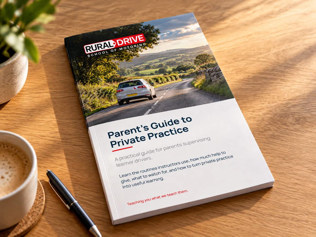 Rural Drive Parent's Guide mockup on a desk with a cup of coffee