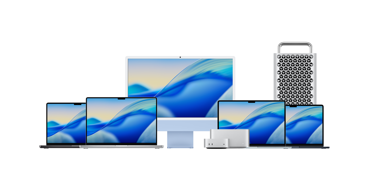 A collection of Apple devices including four laptops of various sizes and colors, a large desktop computer with a blue and beige wave wallpaper on the screen, a compact rectangular device with ports, and a tall, rectangular metallic device with a perforated front and handle on top.