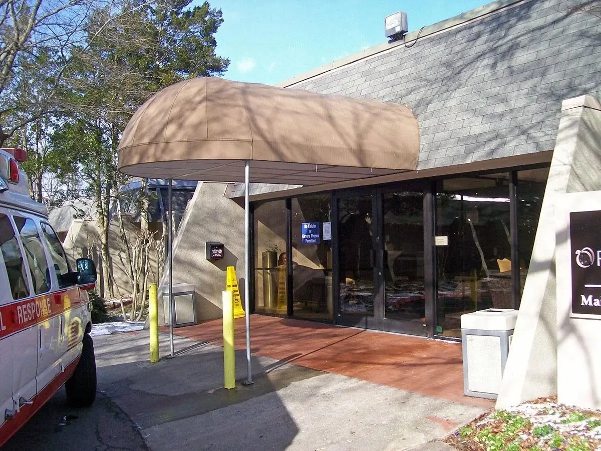 Custom fabric storefront awning over a shop entrance