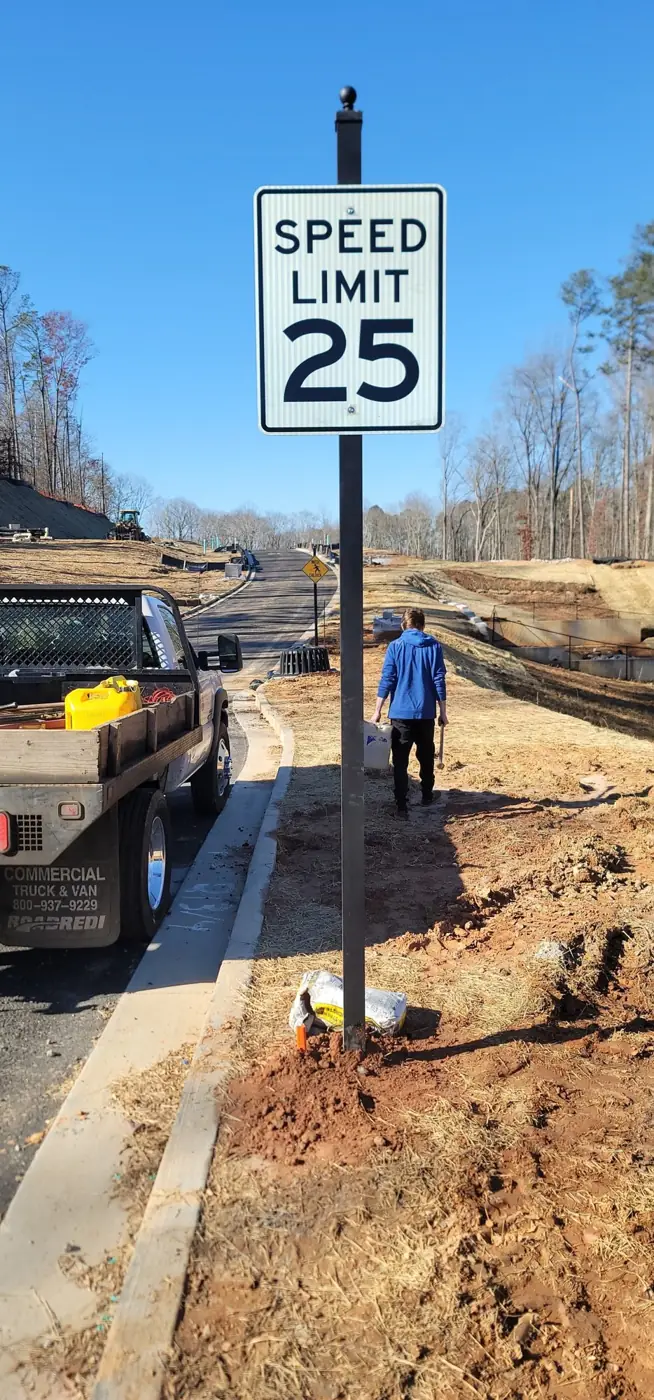 Speed limit 25 sign installed on a decorative post