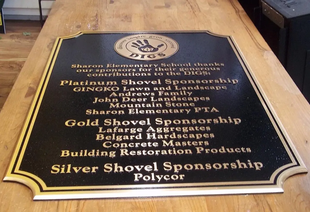 Engraved bronze dedication plaque