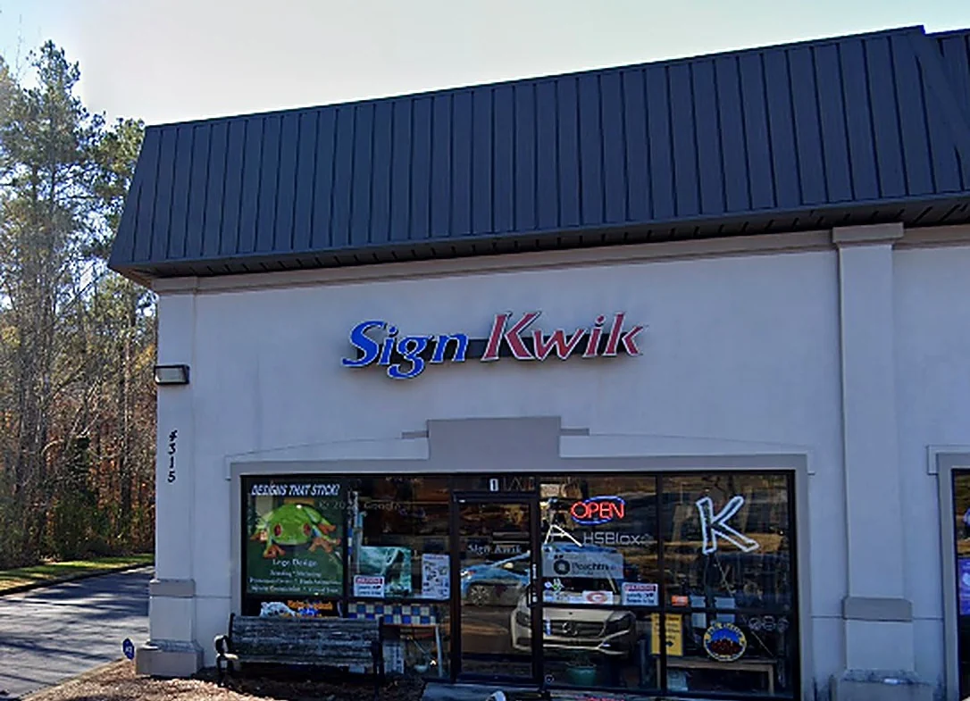 Sign Kwik storefront with lighted channel letters at 4315 Abbotts Bridge Rd in Duluth, GA