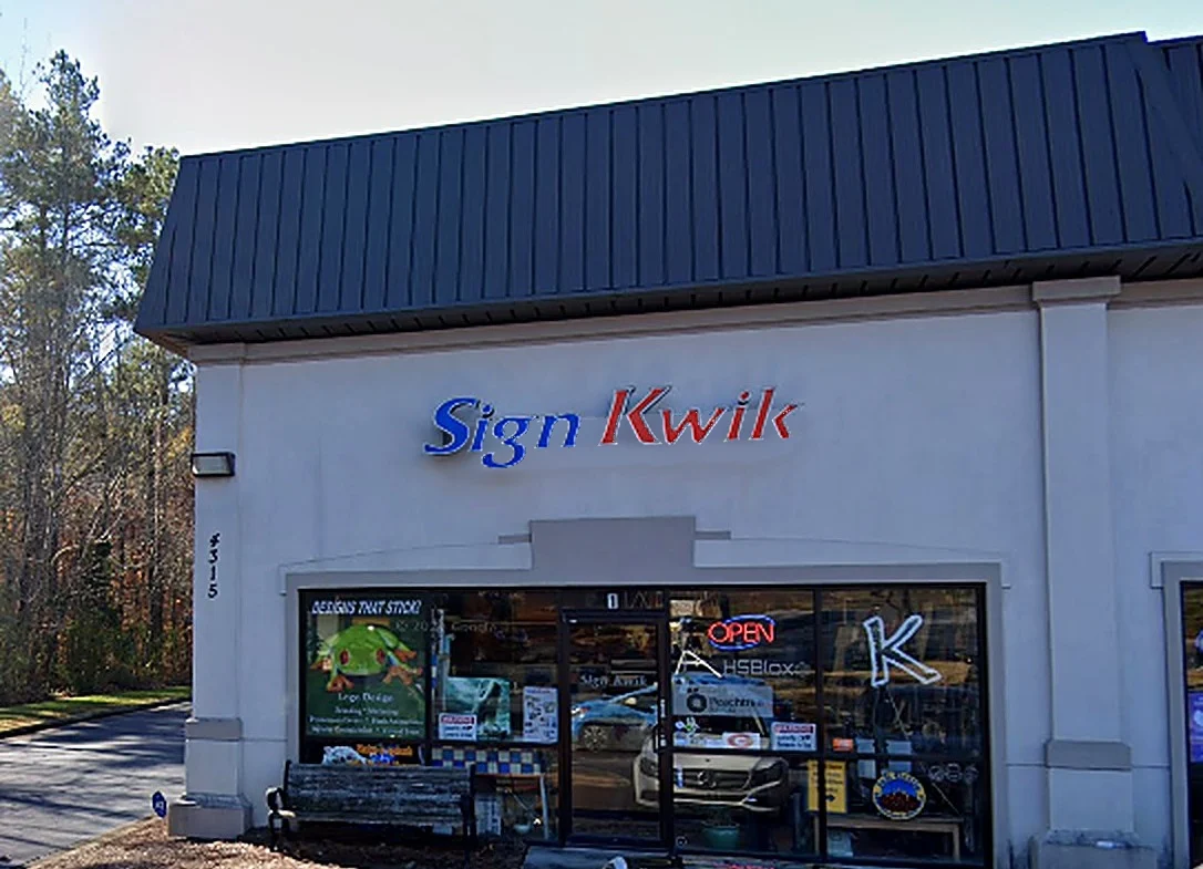 Sign Kwik storefront with lighted channel letters at 4315 Abbotts Bridge Rd in Duluth, GA