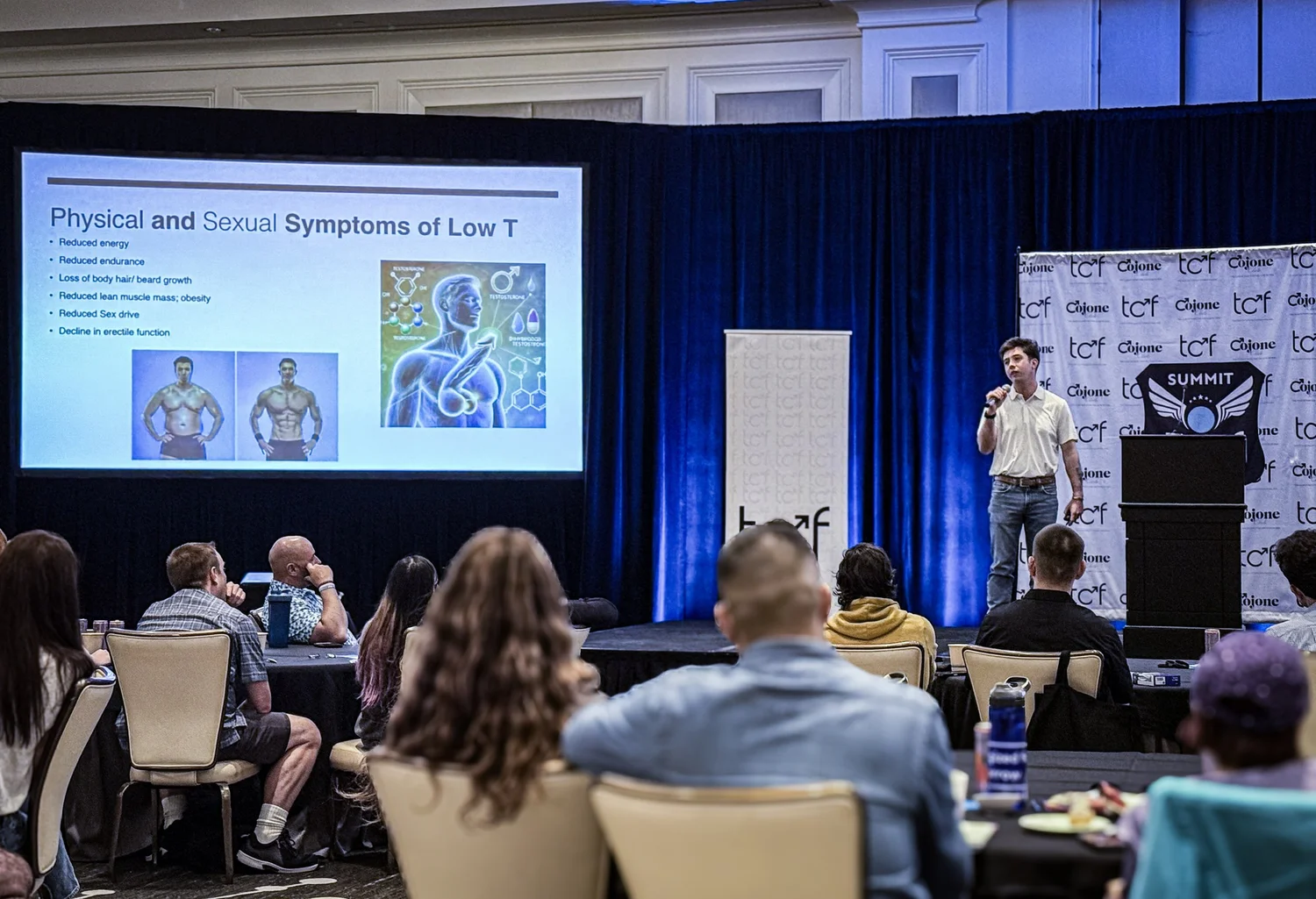 Speaker presenting on the symptoms of low testosterone at the TCF Summit
