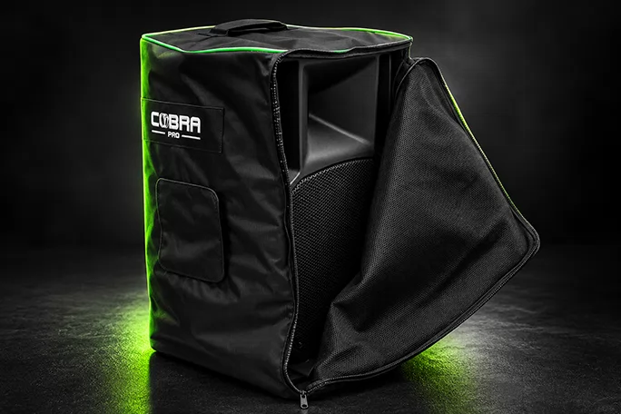 Padded black speaker transport cover with handle openings and zipper