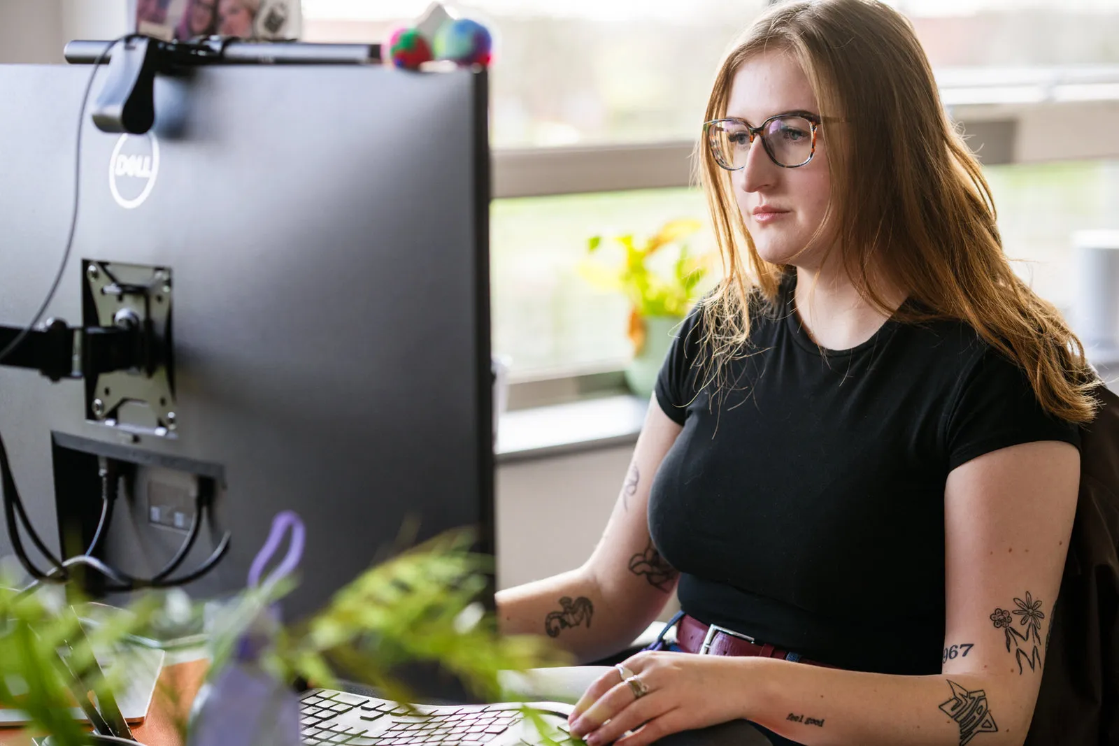 Lydia Finn at Pollard Media working at a computer screen