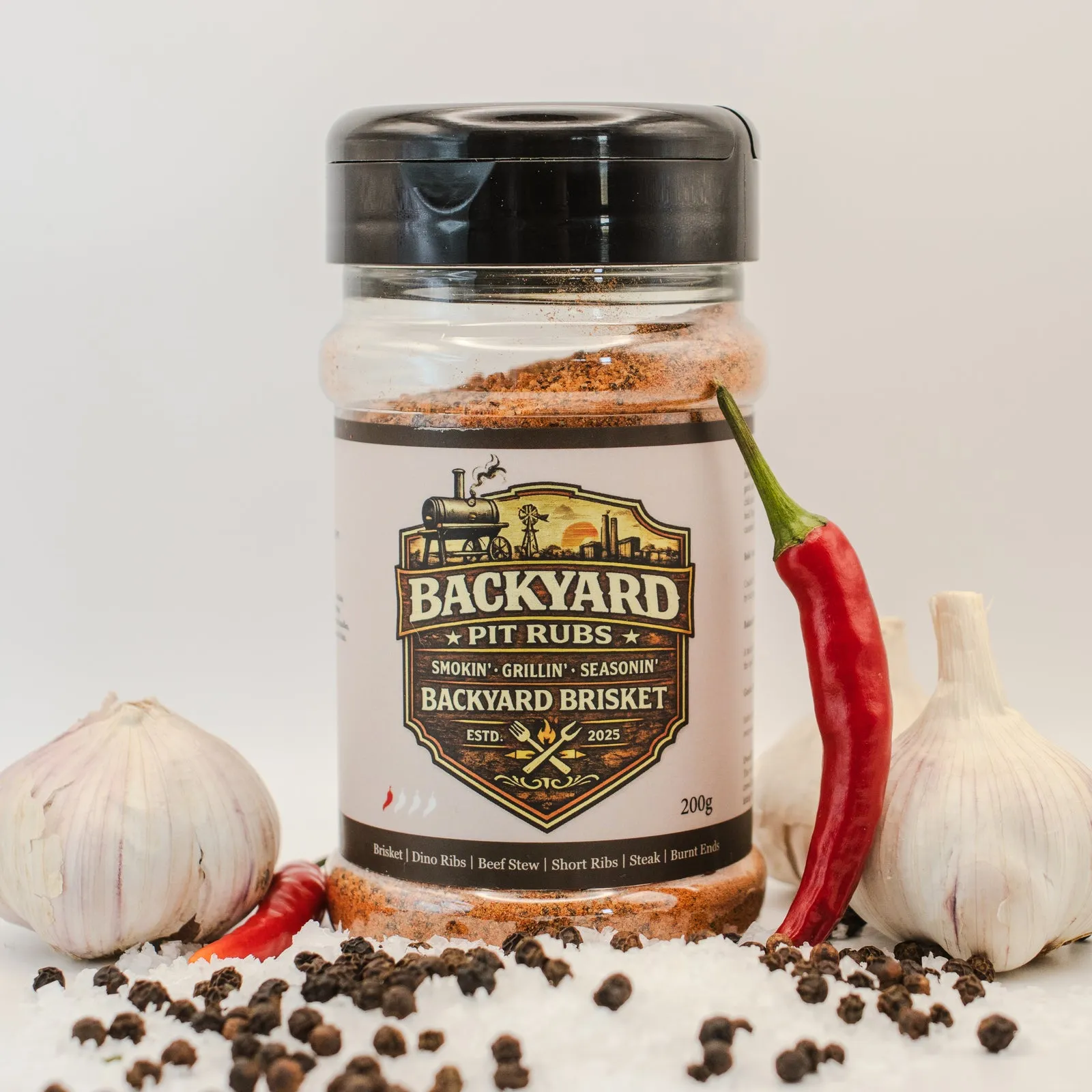 A jar of Backyard Brisket with the old illustrated badge label