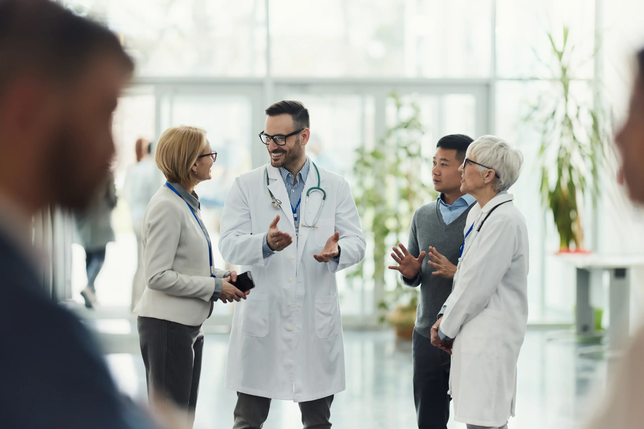 Clinicians talking in a hospital