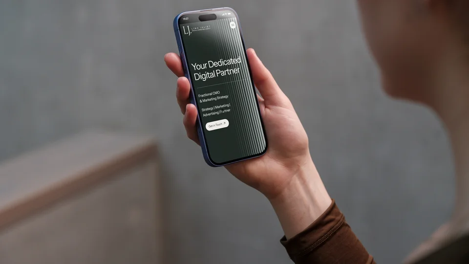 Lima Juliet mobile site on a phone in a woman's hand