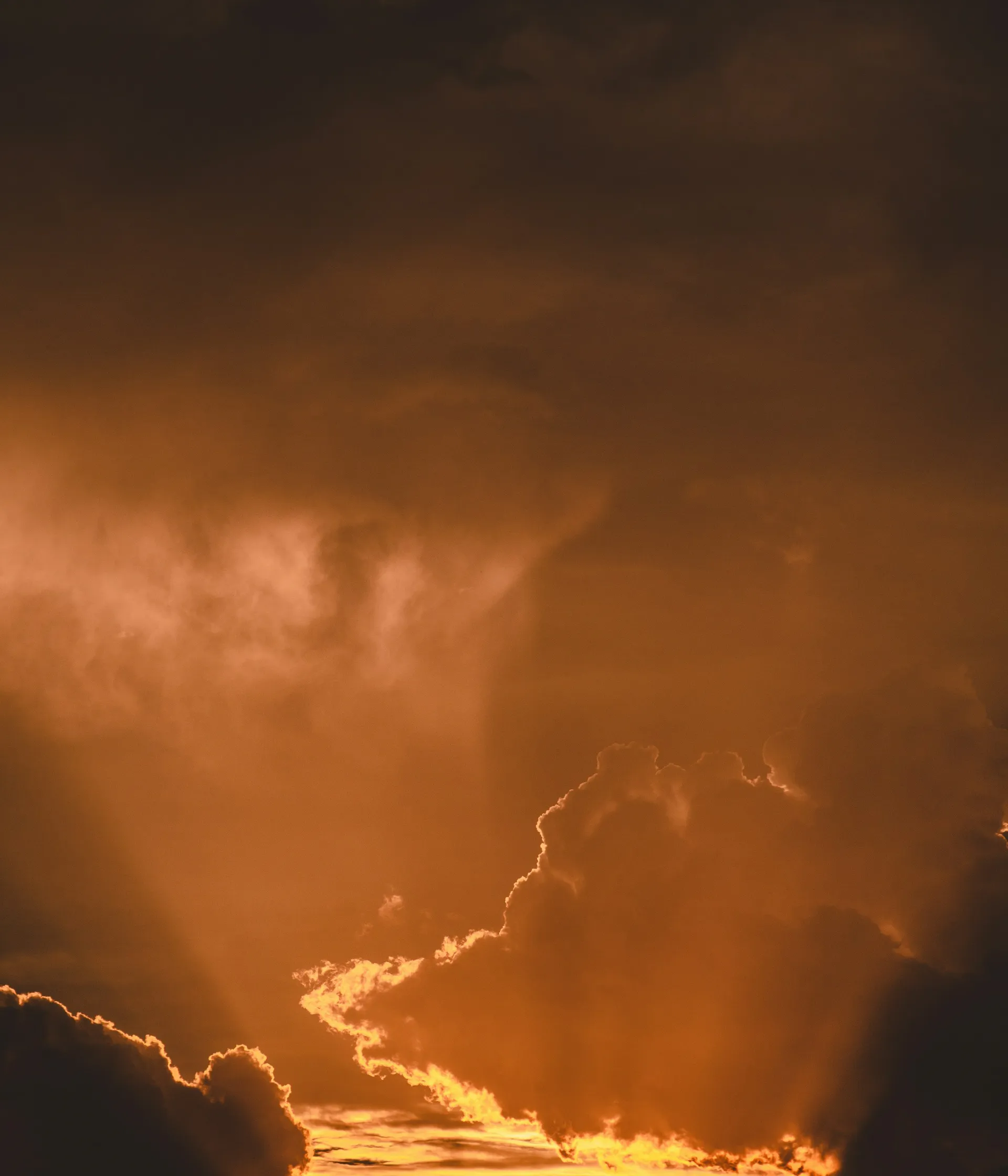 Warm sunset sky with clouds
