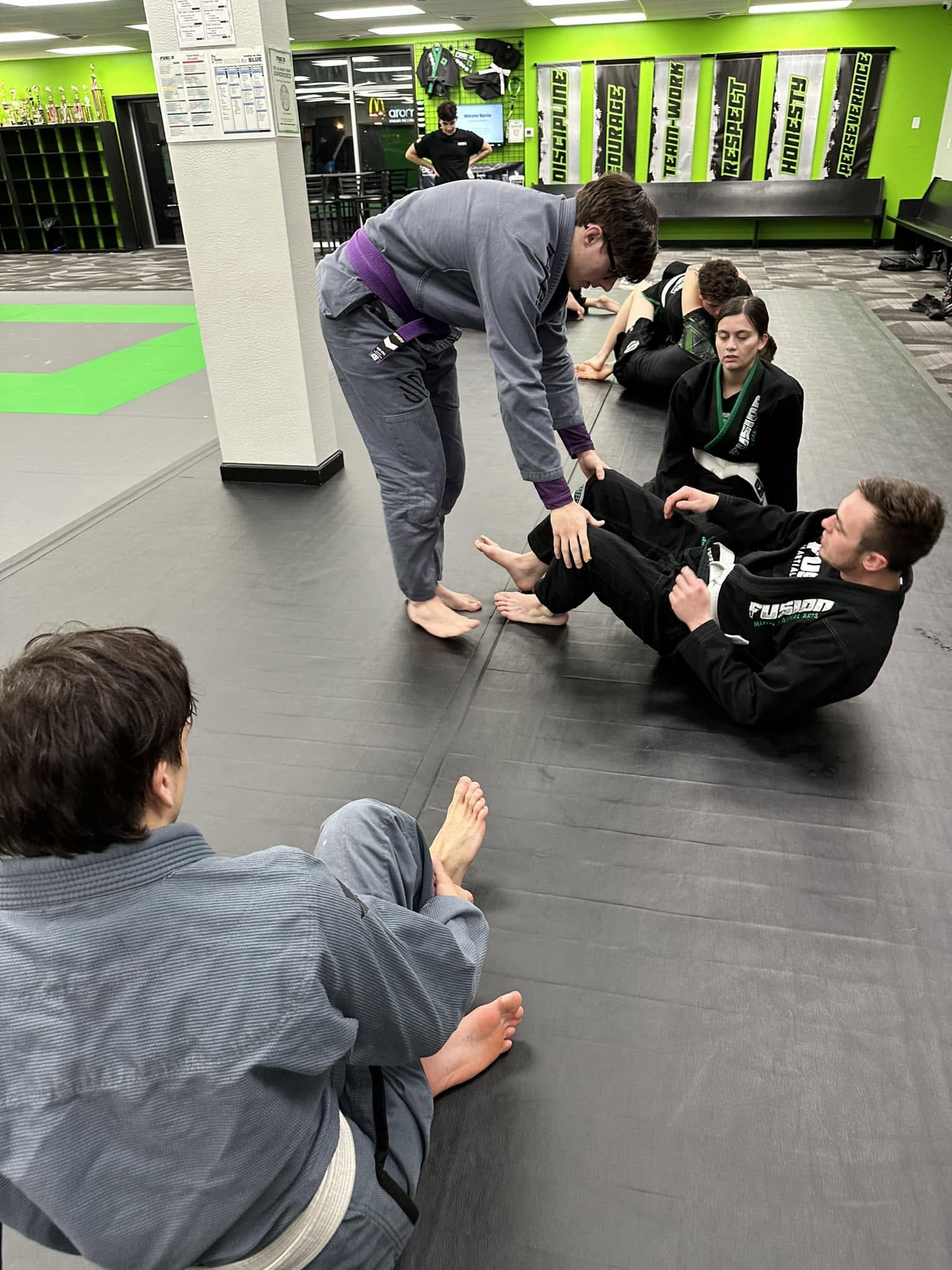 Adult jiu jitsu class demonstration at Fusion Martial Arts in Bloomington, IL
