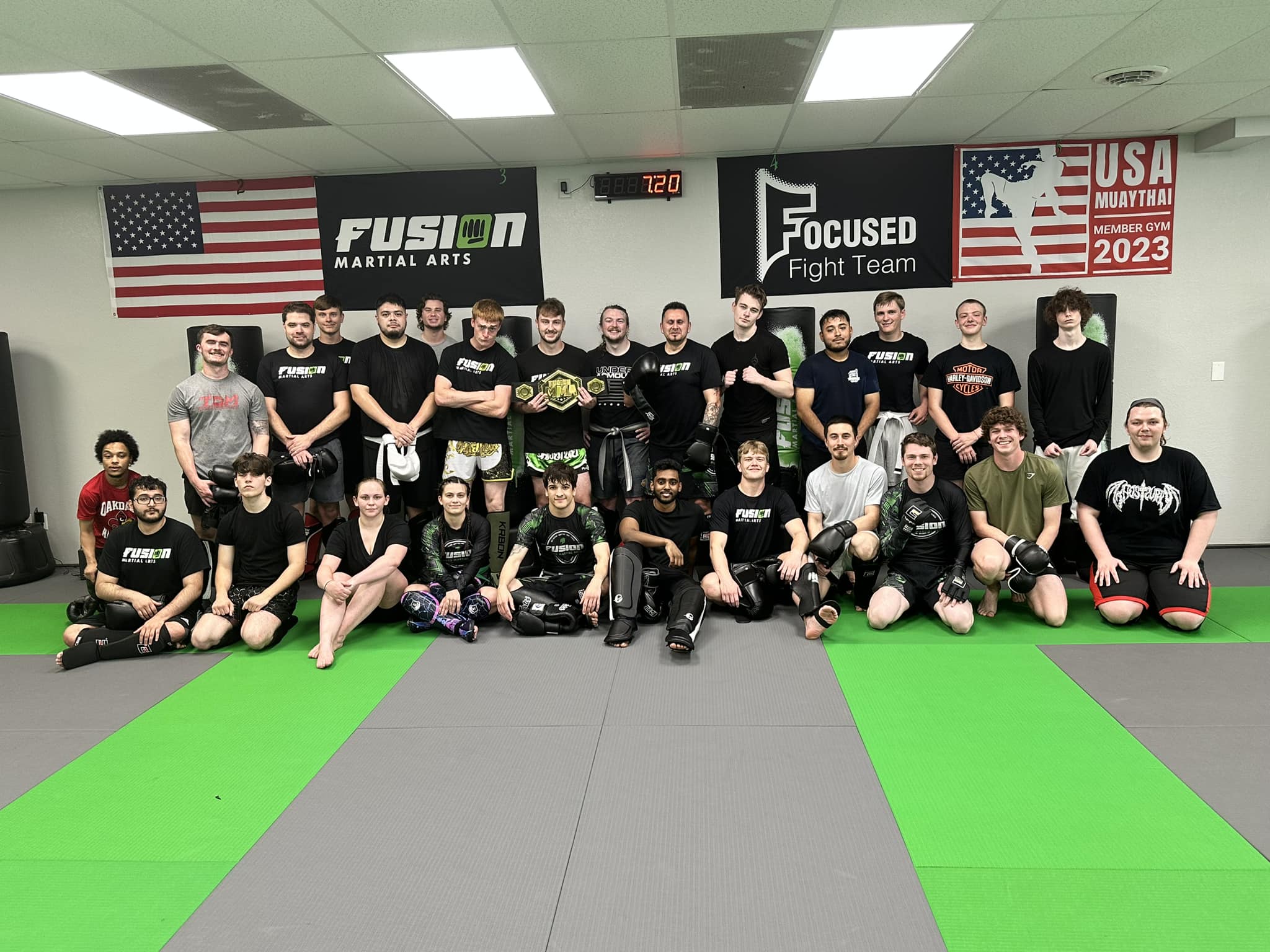 Adult Muay Thai class group at Fusion Martial Arts in Bloomington, IL