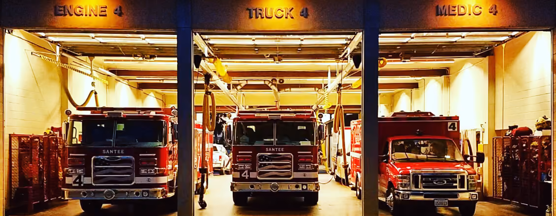 Santee fire station at night with Engine 4, Truck 4 and Medic 4 in their bays