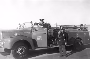 Vintage black-and-white photo of an early Santee fire engine
