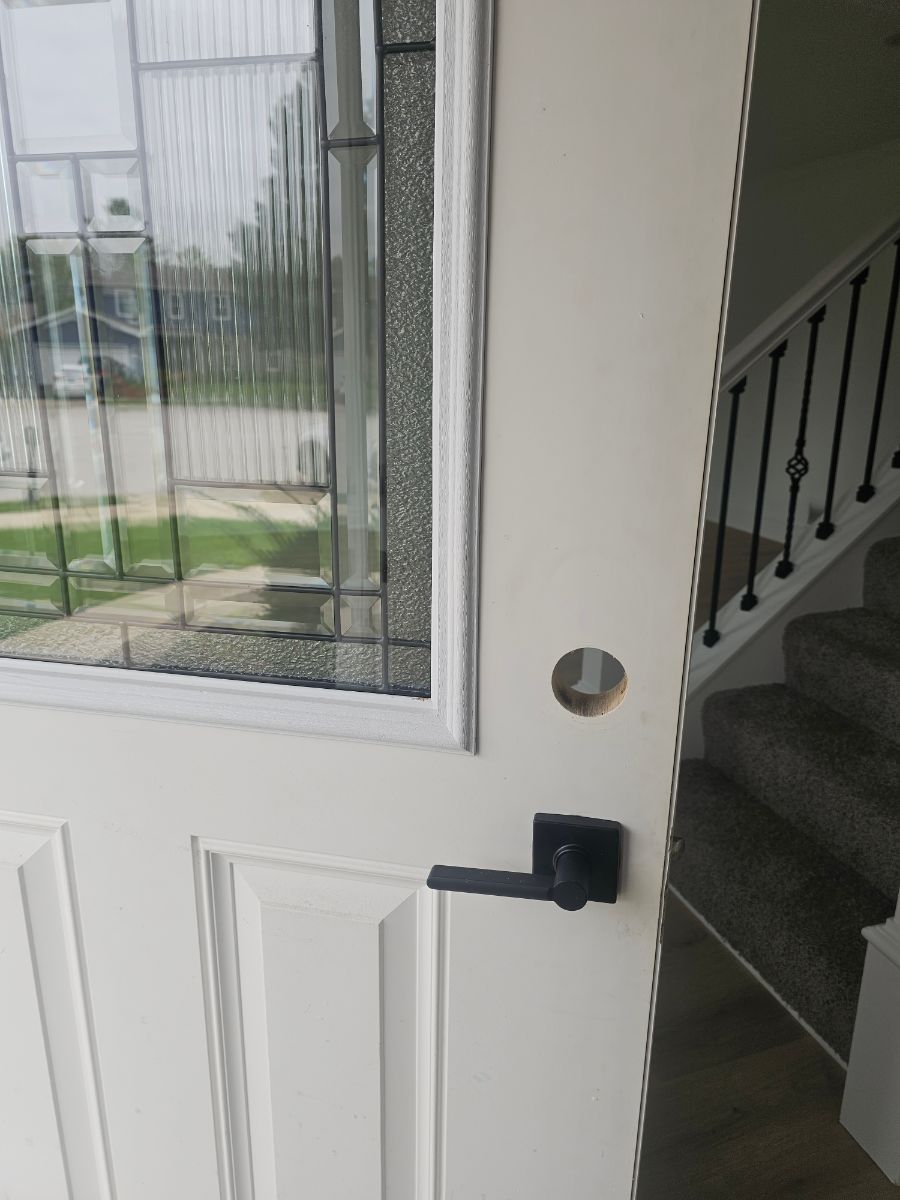 Front door in Aurora before smart lock installation