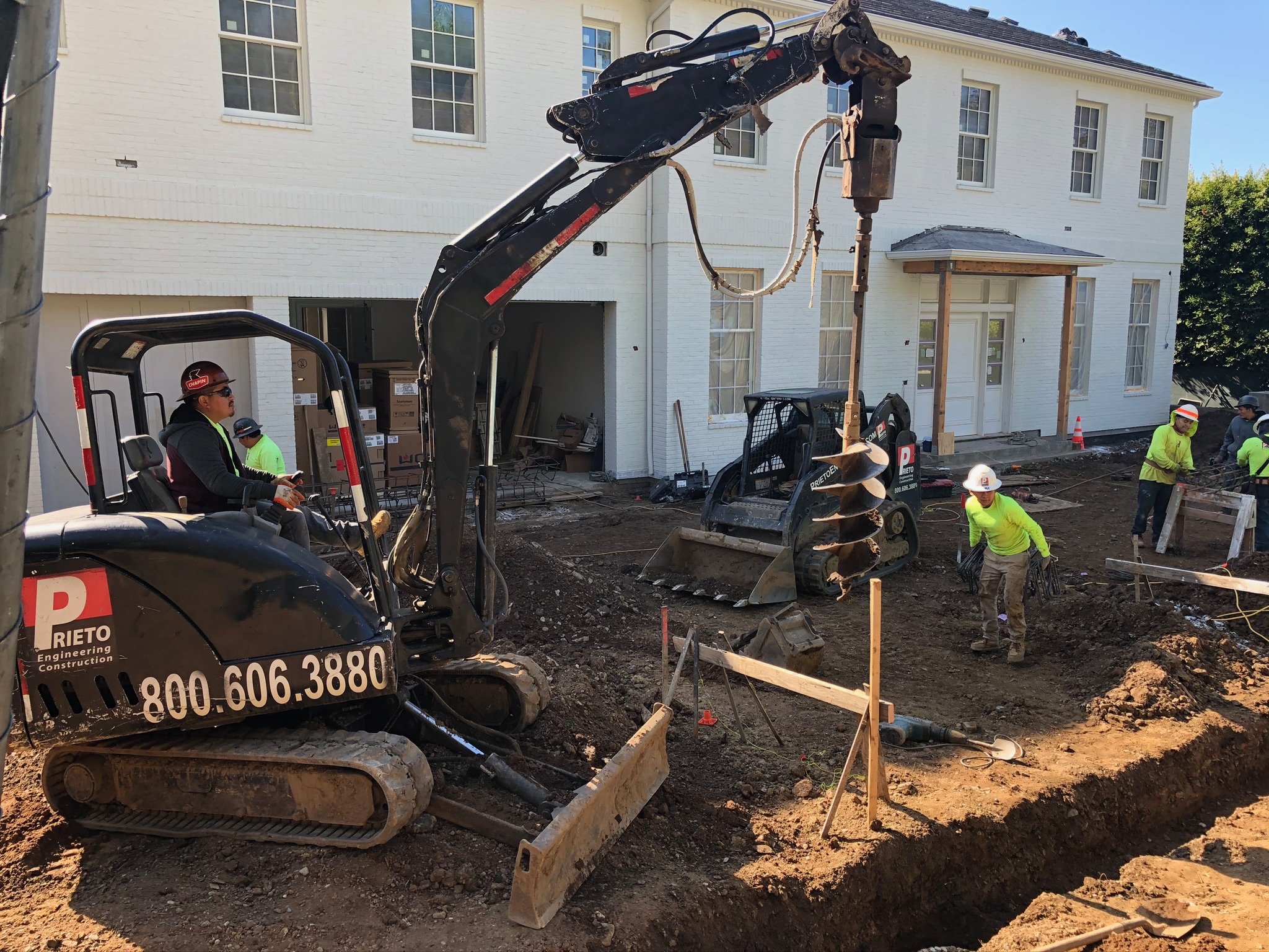 JFPEC excavator with auger drilling caissons