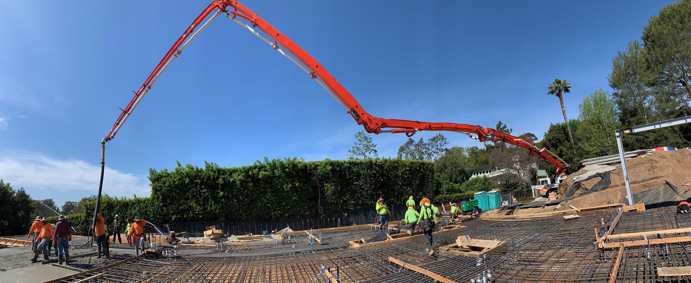 Concrete pump placing a foundation pour