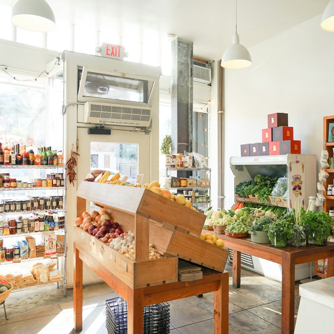 Produce crates and pantry shelves inside Cookbook Echo Park