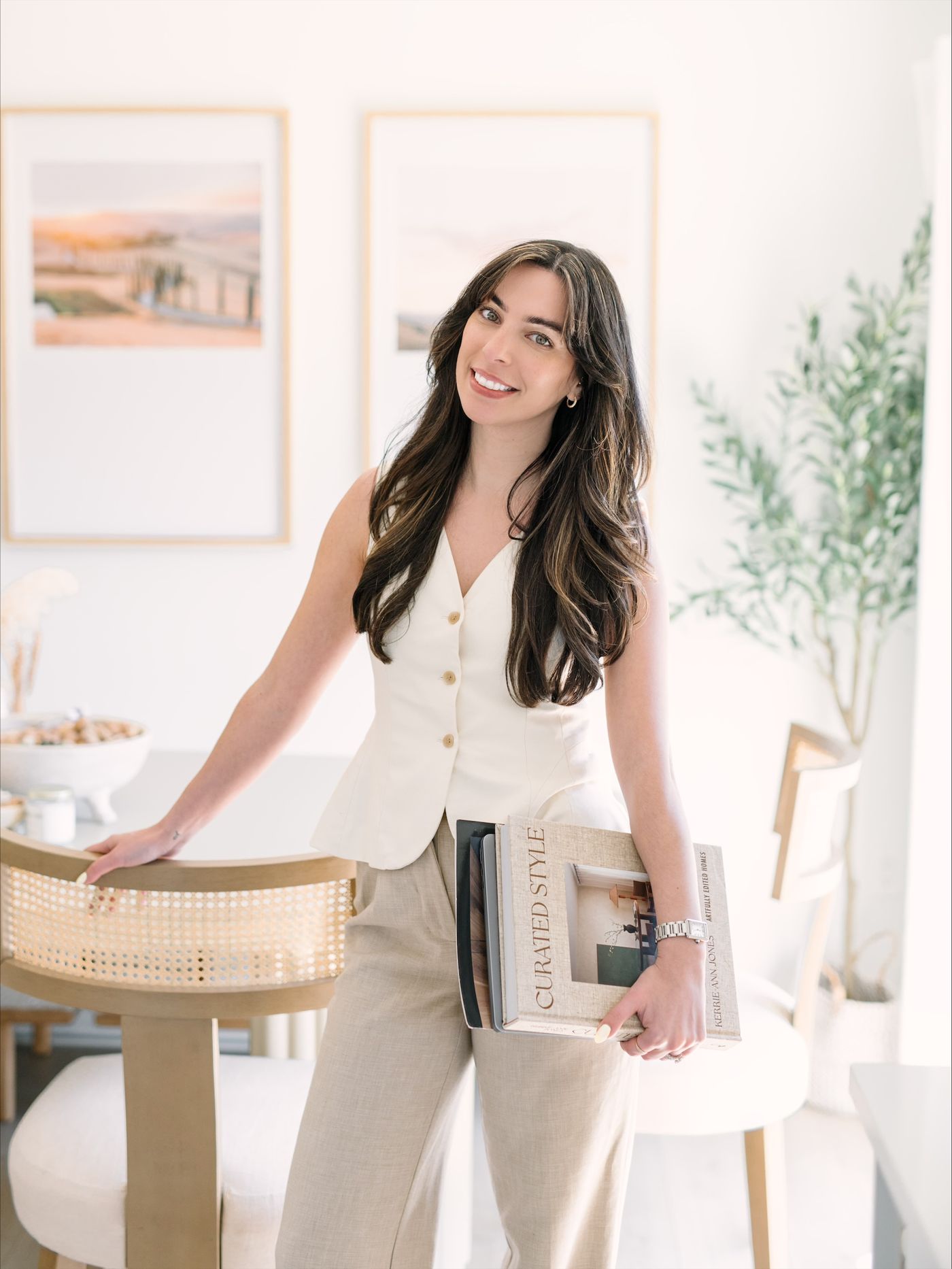 Jessica by a dining table with rattan chairs