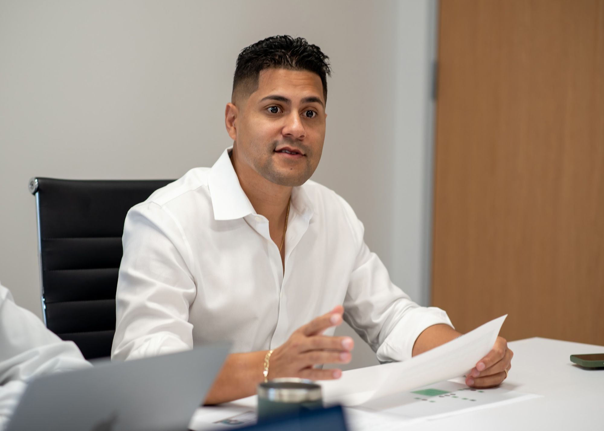 Jose Escalera walking a client through the numbers