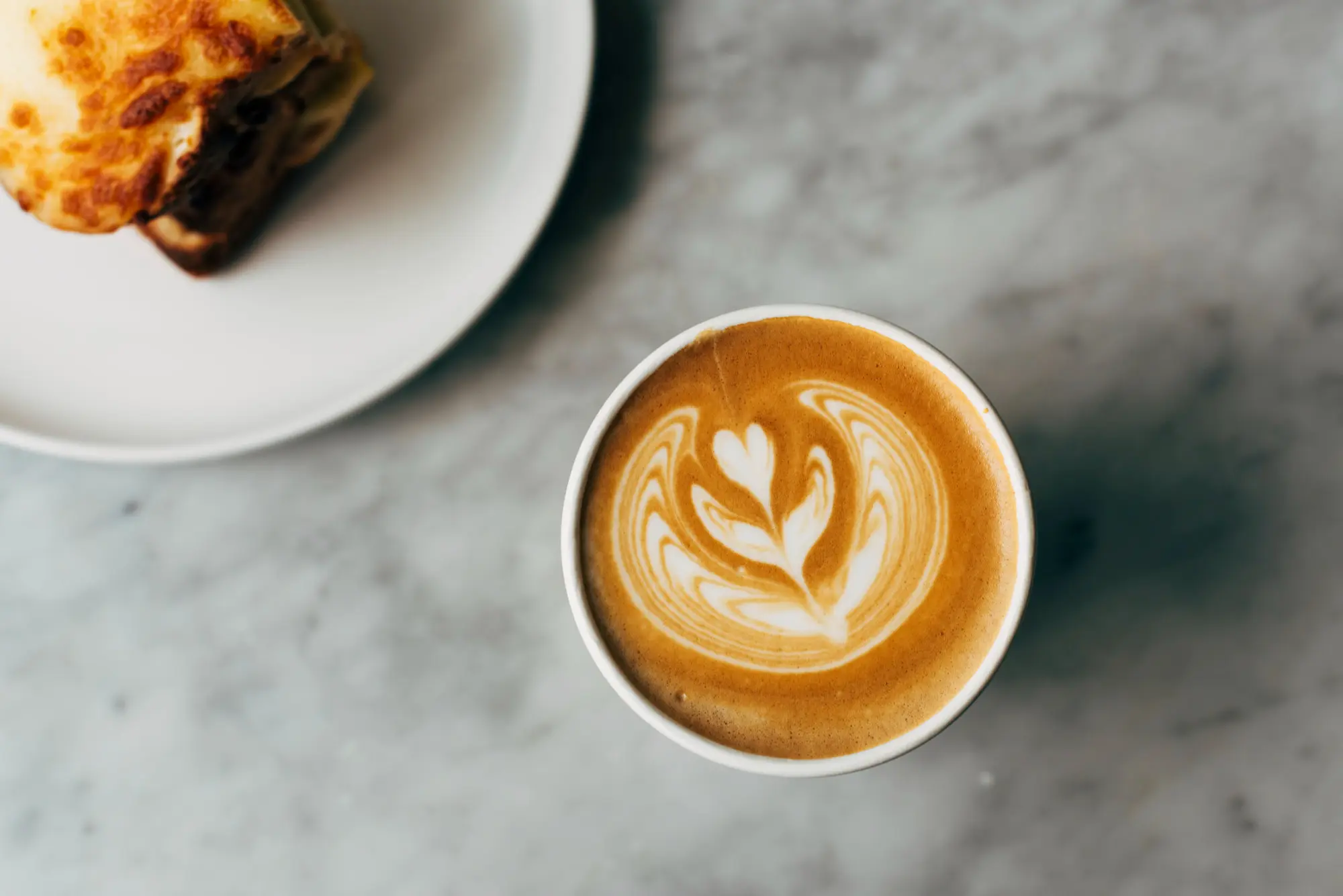 Coffee cup with latte.