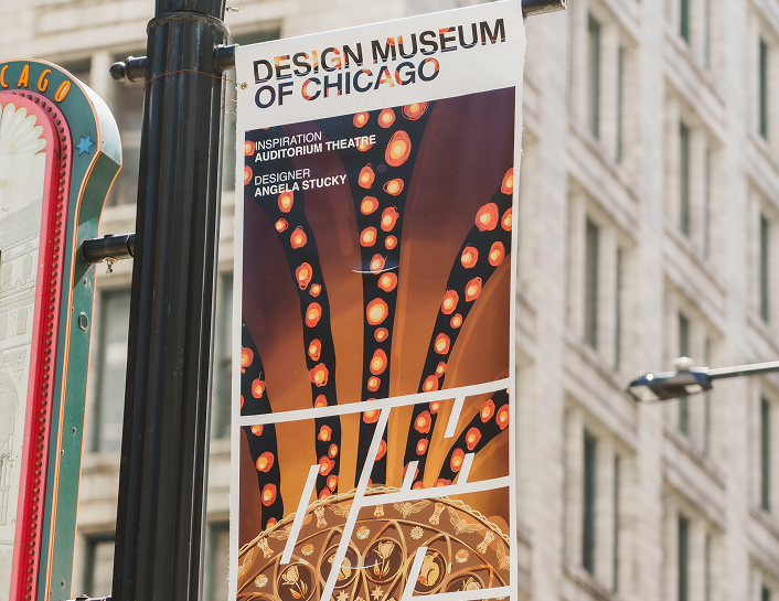 The introductory image for the Design Museum of Chicago Project, showing the banner in it's gorgeous amber browns, with the city of Chicago as the beautiful backdrop.