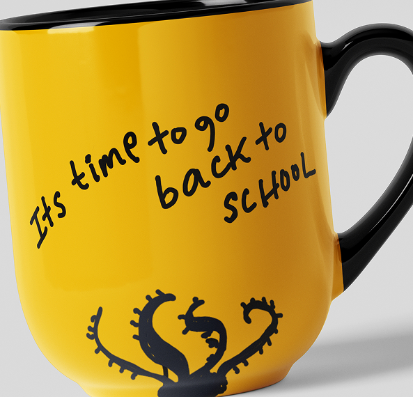 Cute mug designed for Monterey Surf School with a kraken that says "it's time to go back to school"