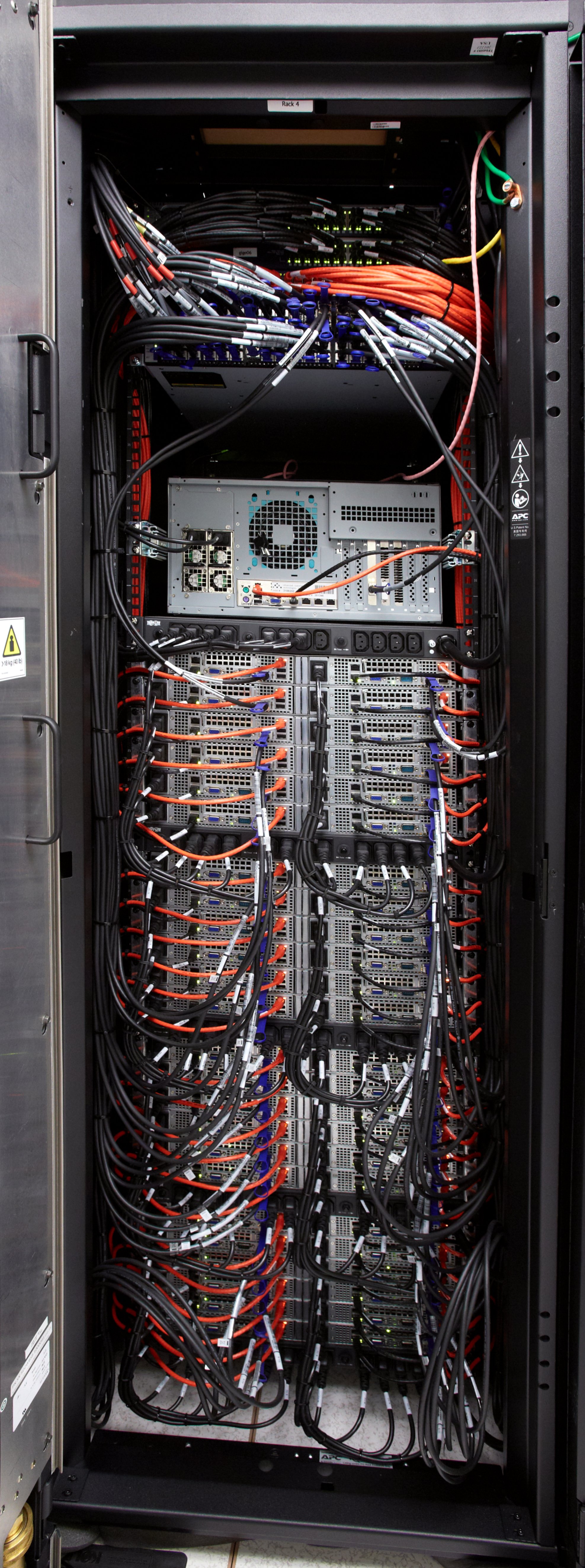 Neatly routed cabling at the back of a cluster rack