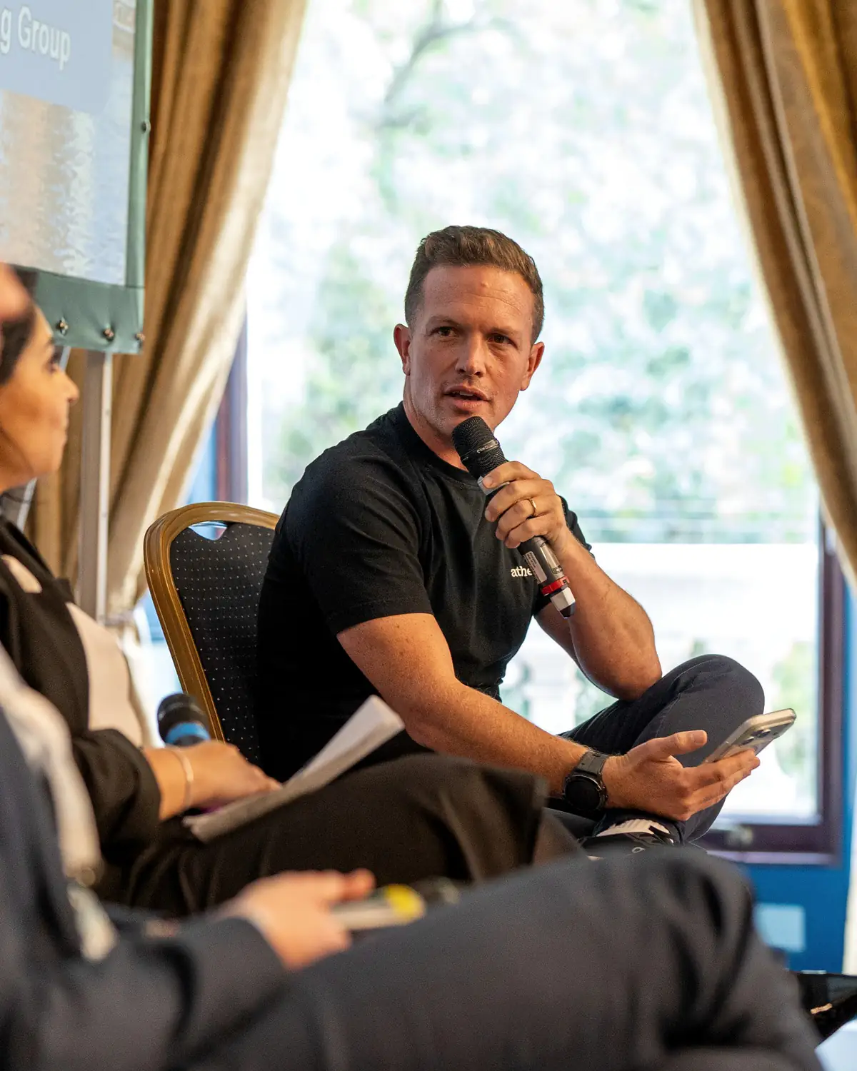 Ben Stocken speaking at a live event
