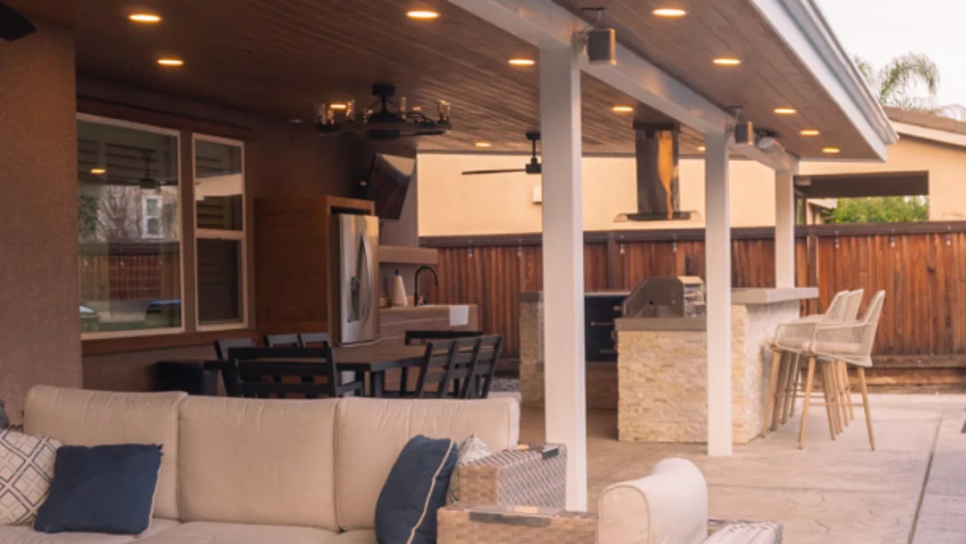 Covered outdoor kitchen and lounge in Brentwood built by JAC Dreamscapes