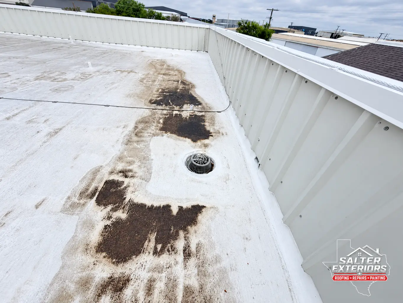 How to Clean Commercial Roof Drains Safely
