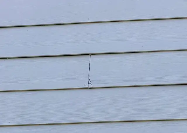 Hail-caused break in Hardie board siding