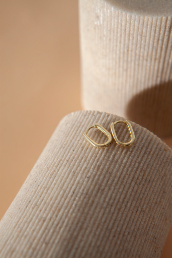 Sculpted Hoops worn on the ear