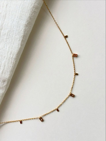 Gold chains layered at different lengths