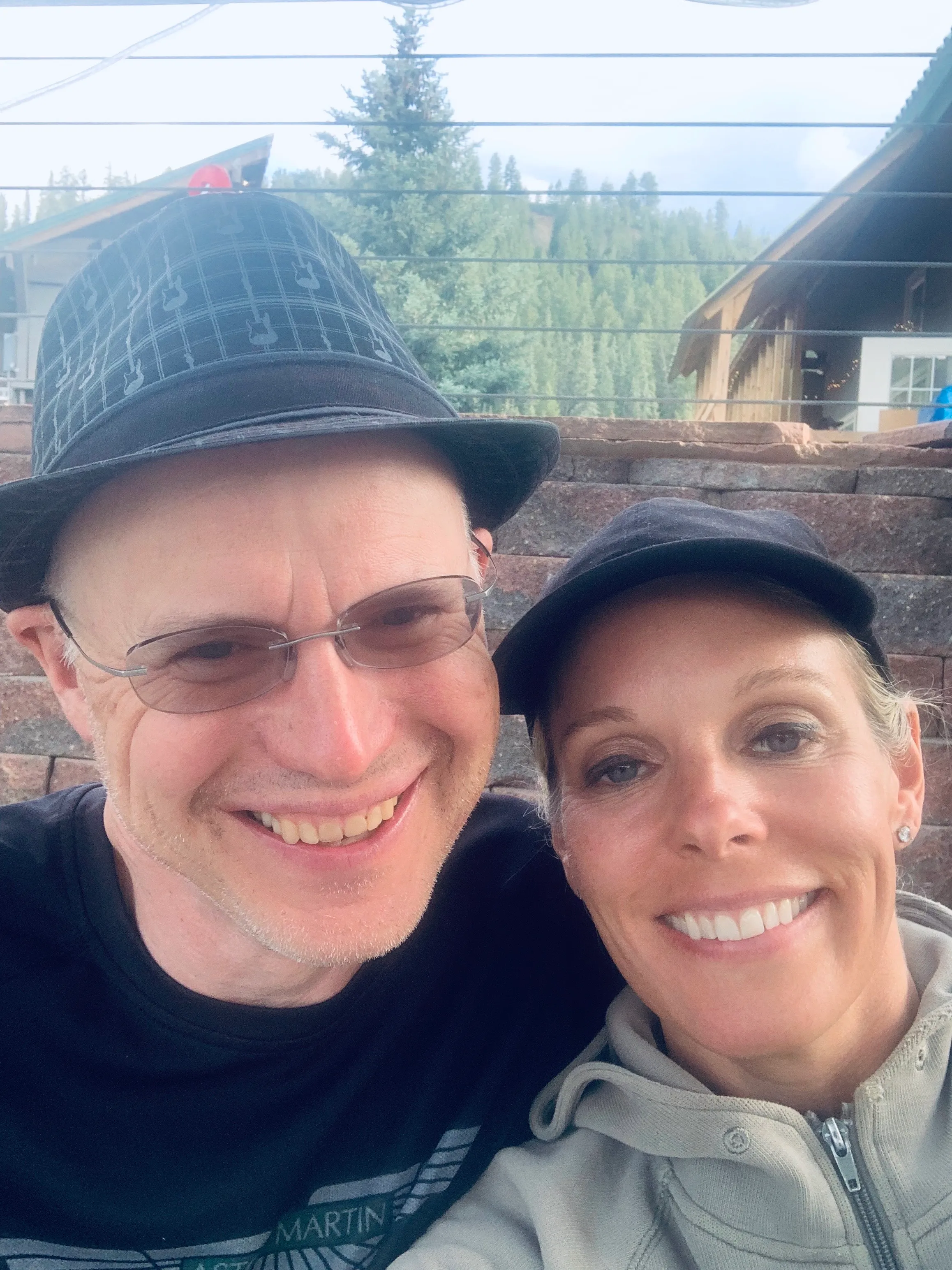 Dr. Lisa Leit and her husband, Dean Prichard, smiling together.