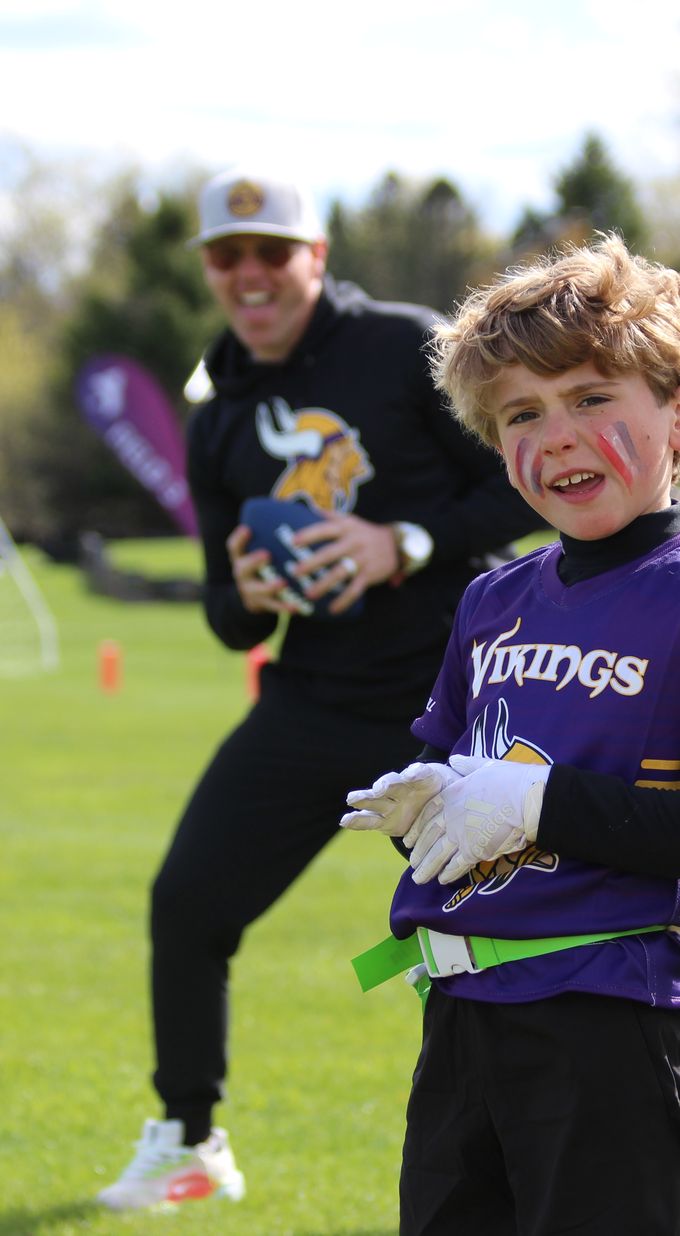 Ryan coaching Bennett's flag football team