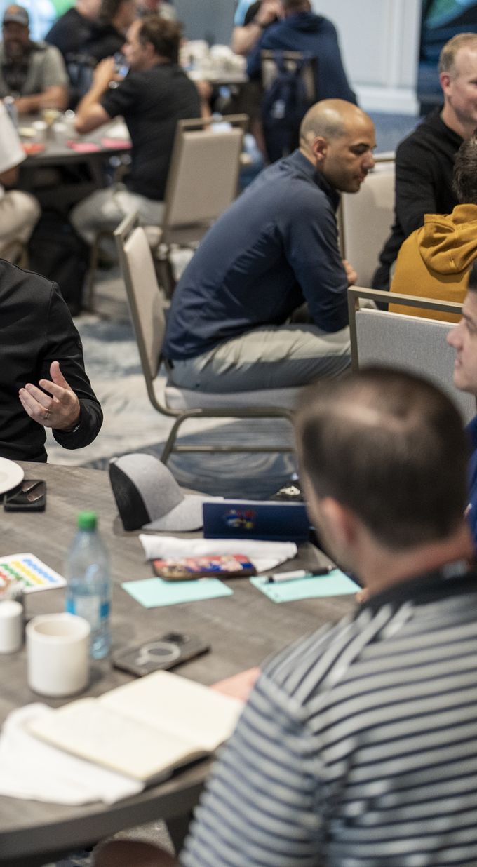 A small-group conversation at a round table