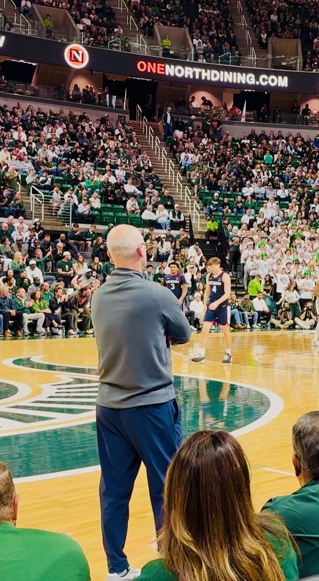 Ryan Blanck courtside at a college basketball game