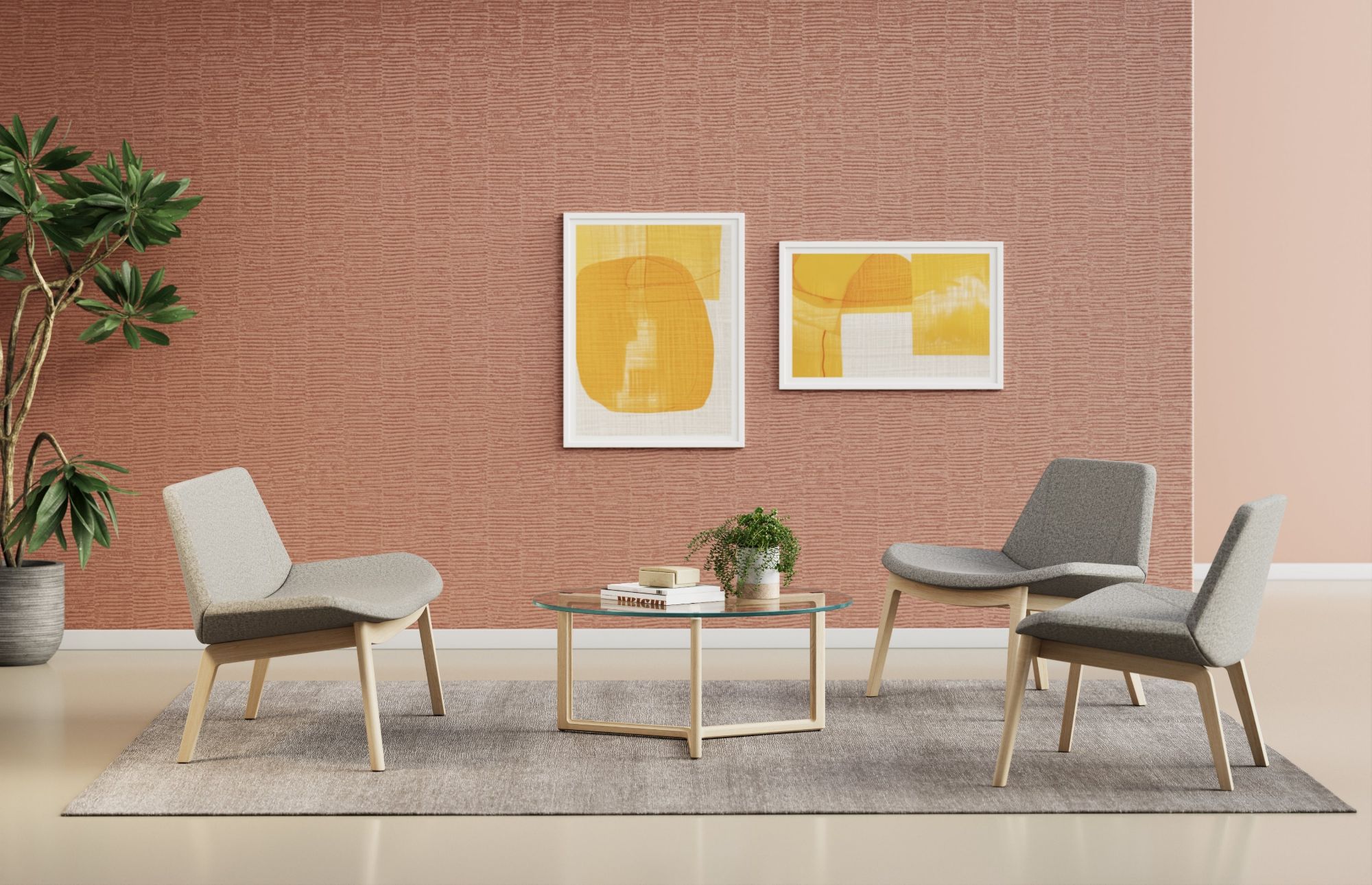 Cumberland lounge chairs and a glass coffee table in a warm, softly lit seating area