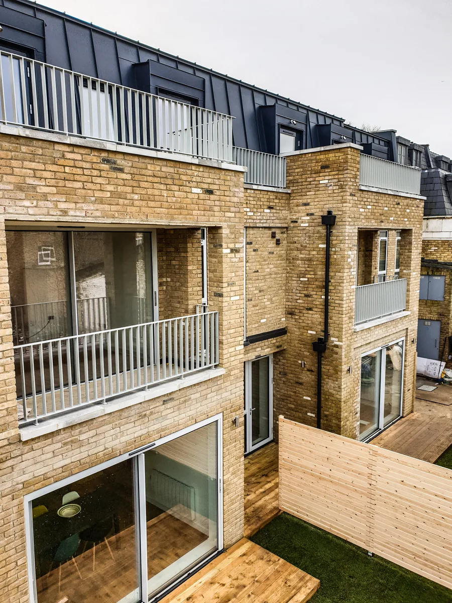 Dulwich mews – airspace and conversion of a former MOT centre into 7 apartments by Kisiel Group