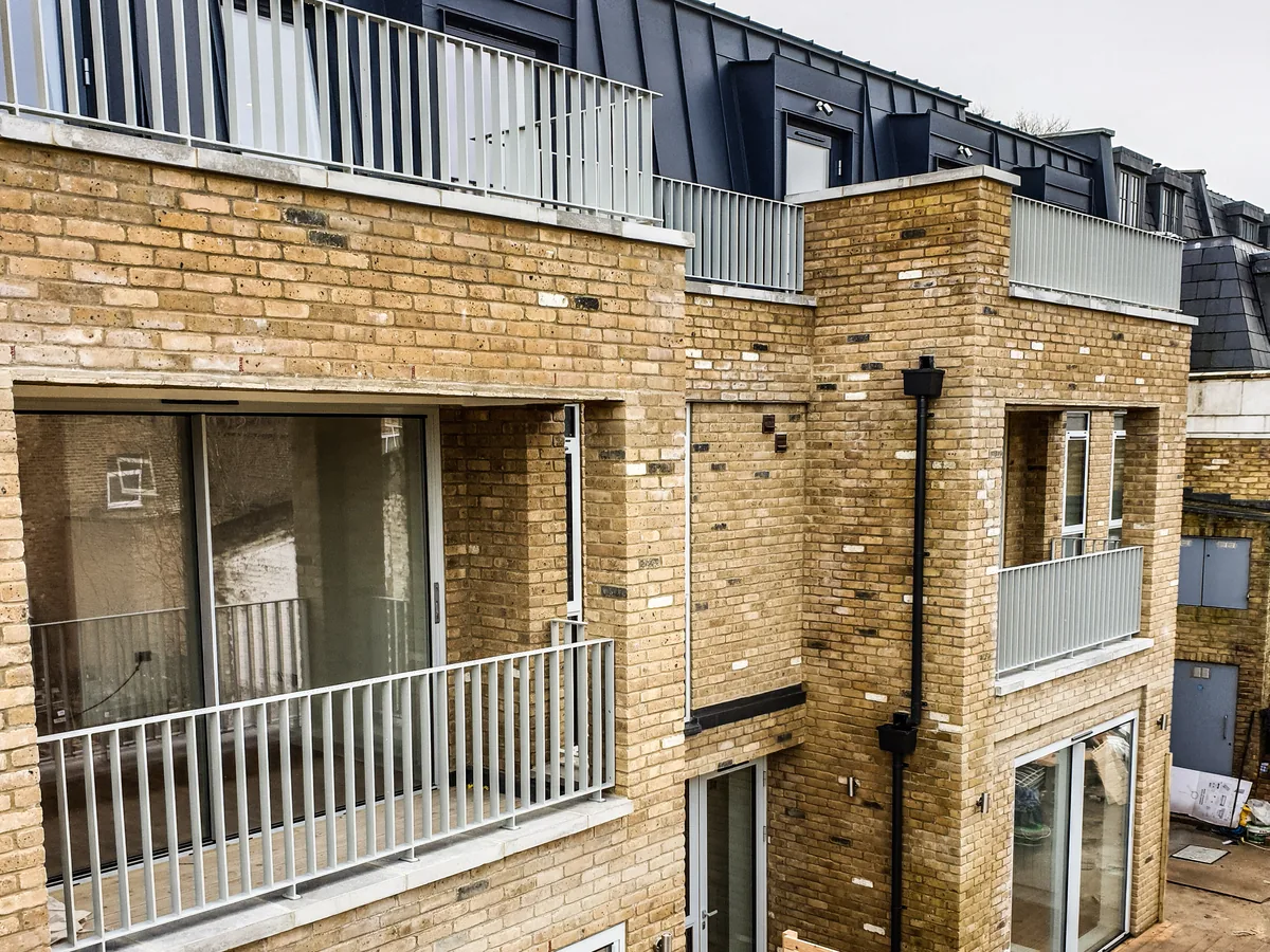 Dulwich mews – airspace and conversion of a former MOT centre into 7 apartments by Kisiel Group