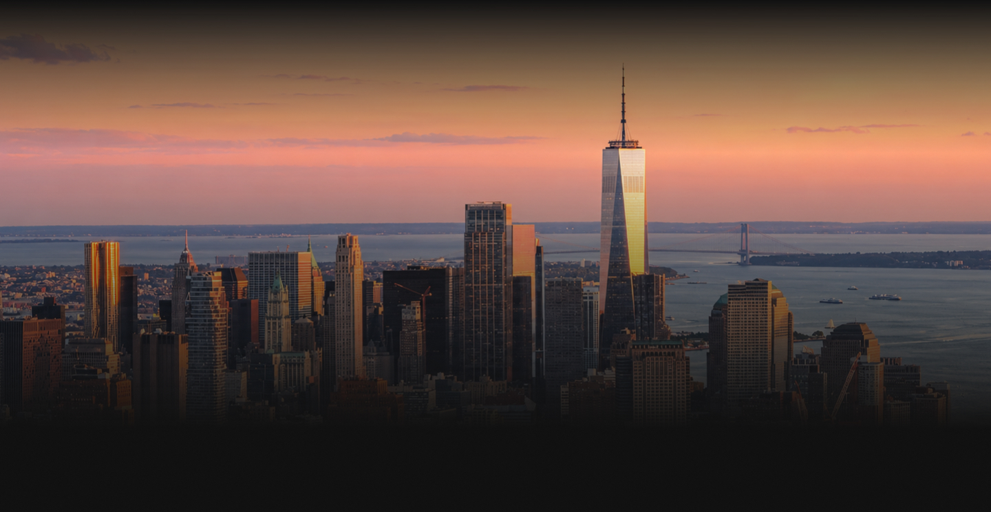 One World Trade Center and the Lower Manhattan skyline at sunset