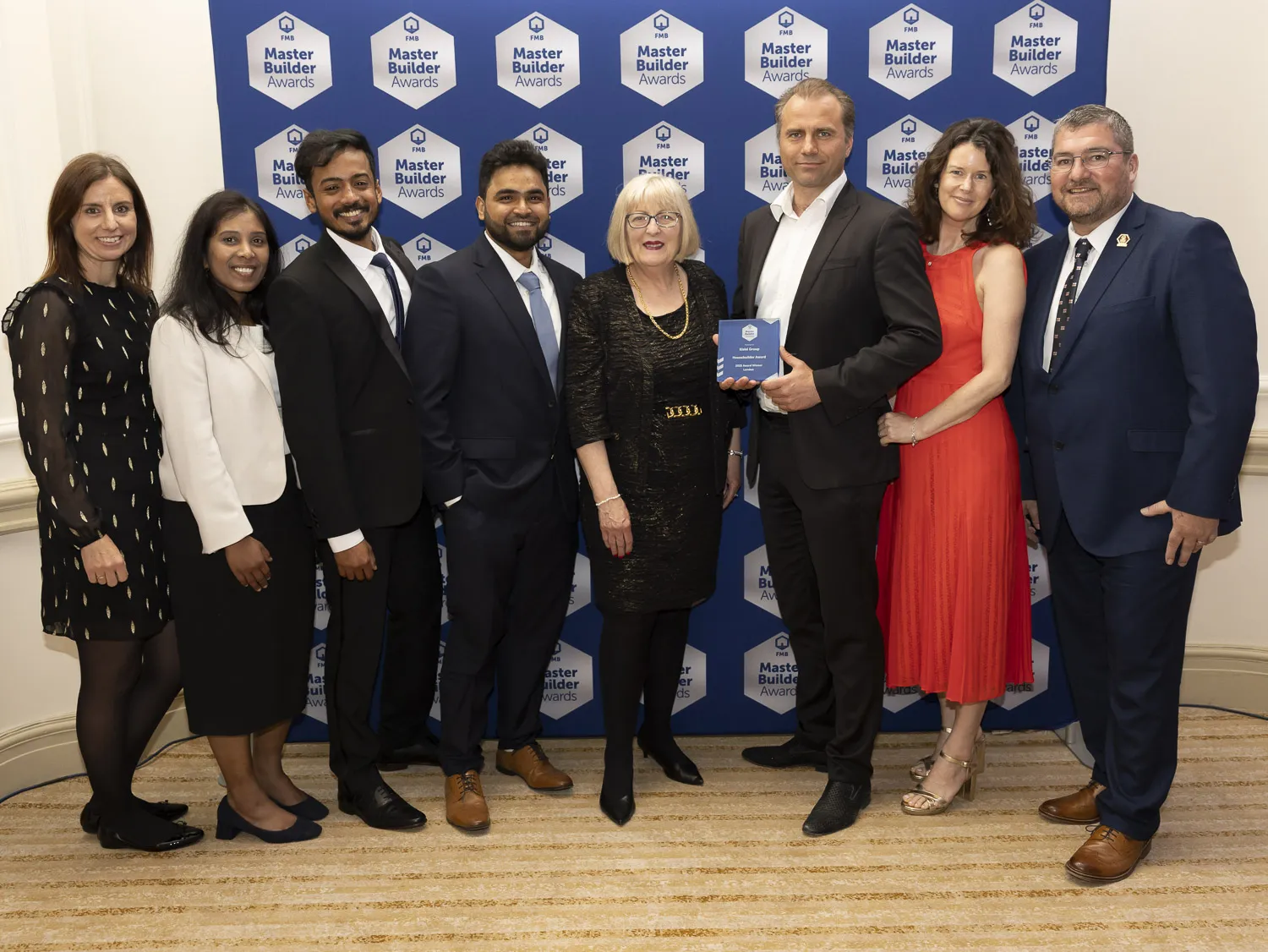 Kisiel Group team receiving the Housebuilder Award at the FMB London Master Builder Awards