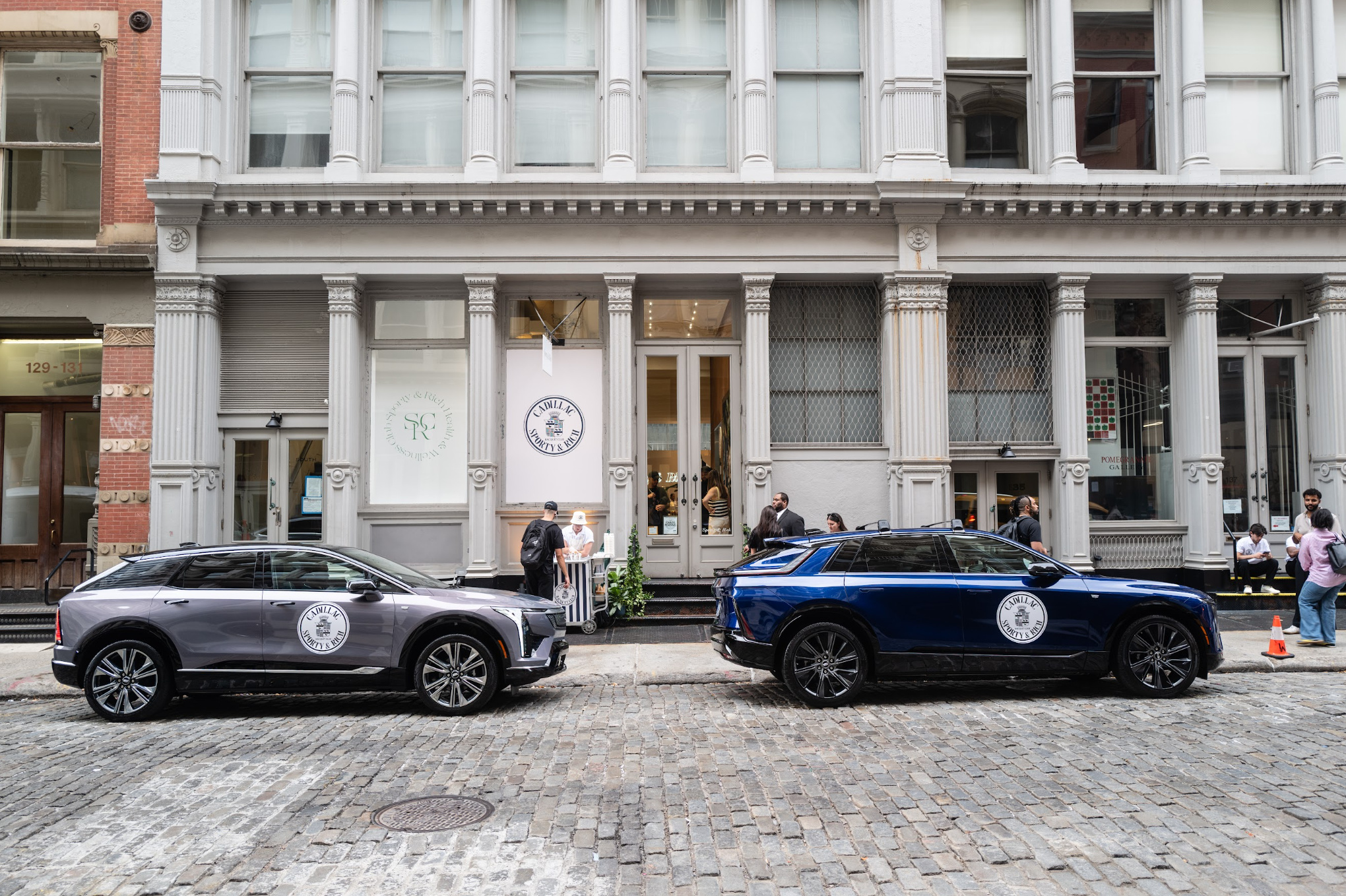 Cadillac × Sporty & Rich storefront with Cadillac vehicles