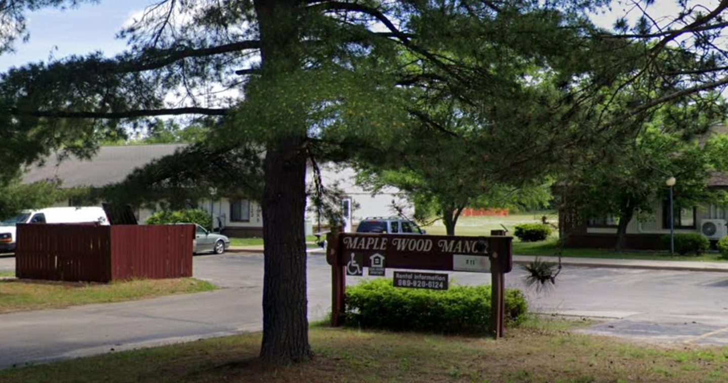 Maplewood Apartments, Mio, MI, front sign