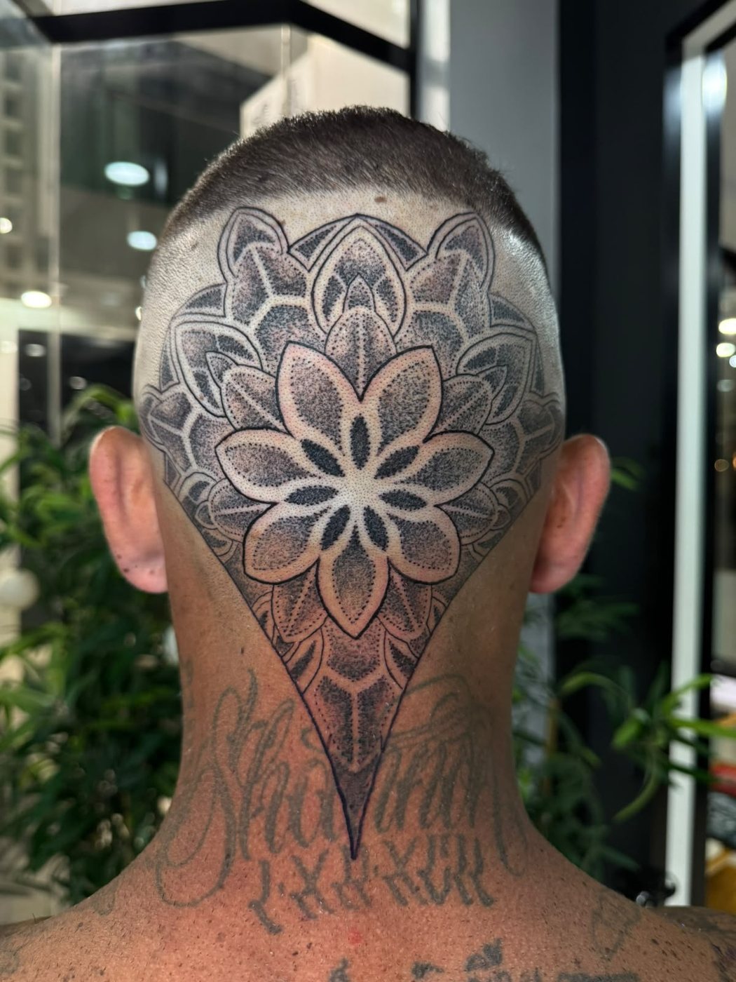 Mandala head and neck tattoo by Augusto at Squires Ink, Surfers Paradise