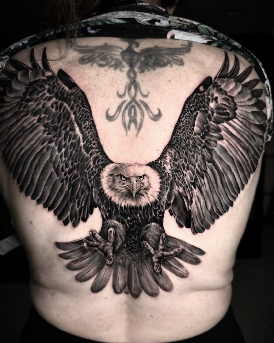Black and grey eagle back piece by Valerio at Squires Ink, Surfers Paradise