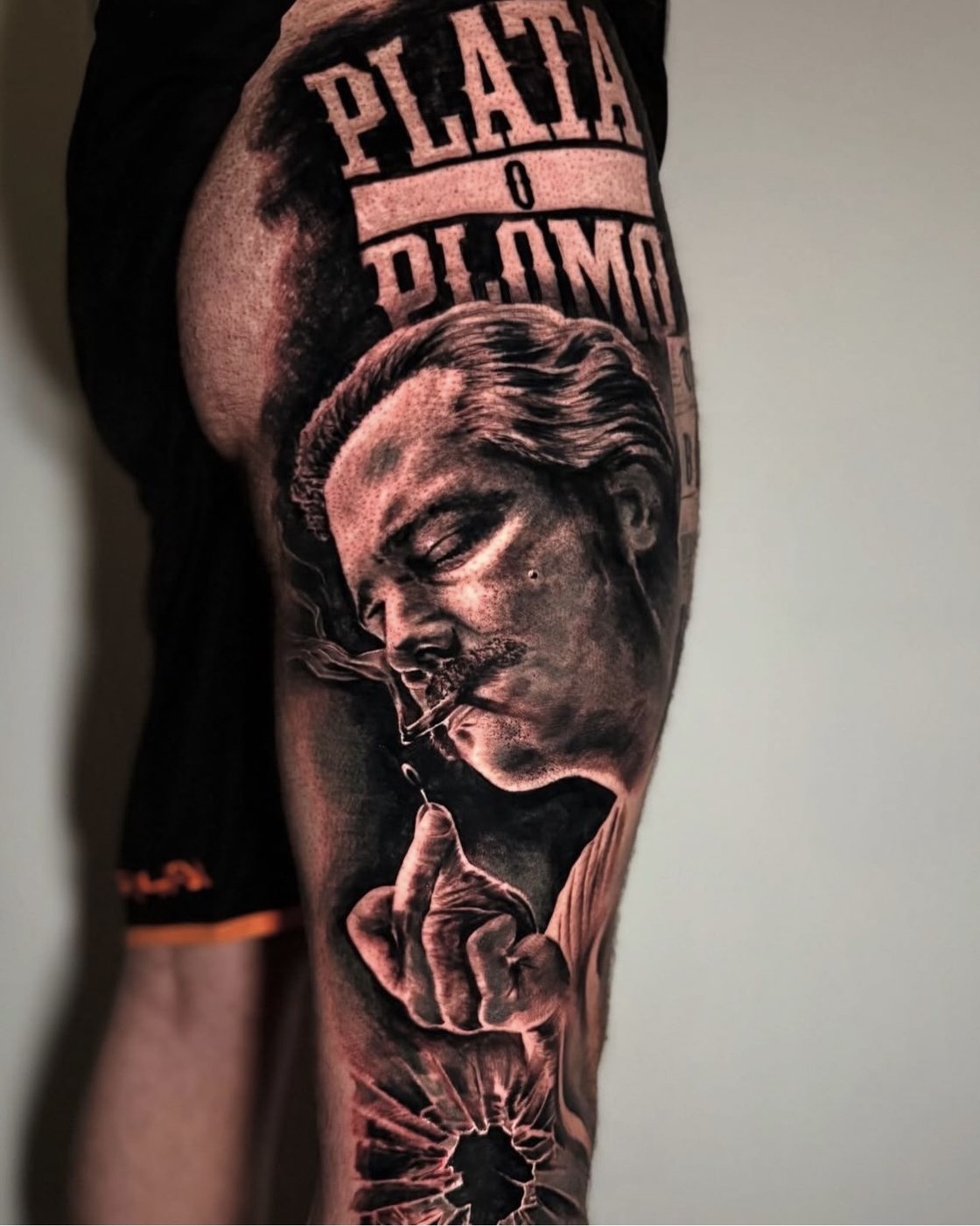 Black and grey realism portrait leg sleeve by Valerio at Squires Ink, Surfers Paradise